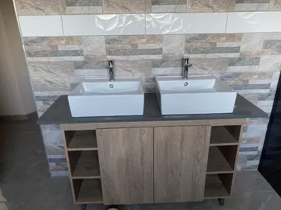 two sinks on a counter in a bathroom at 36 on EAGLE DRIVE in Modimolle