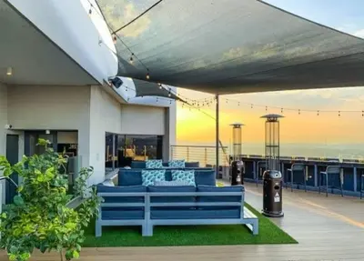 a blue couch sitting on top of a house at Menlyn Maine Trilogy 1417 in Pretoria