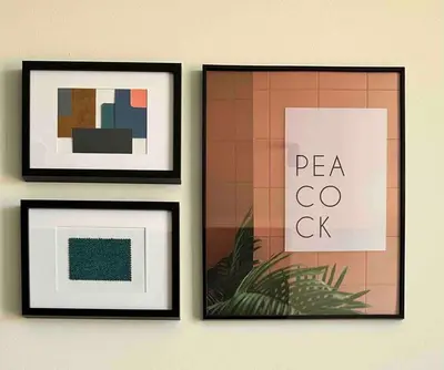 four framed pictures hanging on a wall at Explore Ellipse - Peacock Room in Midrand