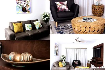 a living room with a couch and a table at Serenity Stay at The Blyde River Walk Estate in Pretoria