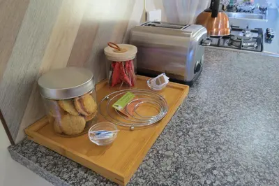 a cutting board with bread on a counter in a kitchen at Zur Alten Mine in Graskop