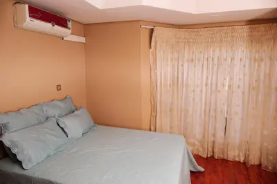 a bedroom with a bed and a window at Un-Furnished Rooms Contractors Accomodation at 66 Pongola Street, MIDDELBURG, Mpumalanga in Middelburg