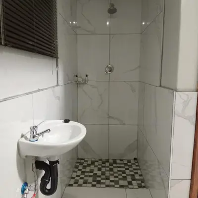 a bathroom with a sink and a shower at Backyard Stay in Pretoria