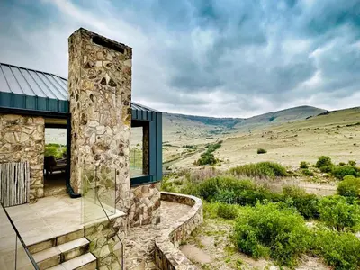 a stone house with a view of the desert at Riverbend on Komati in Machadodorp