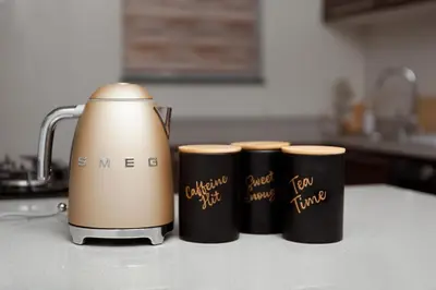 three coffee cups sitting on top of a kitchen counter at Closer to Home Luxury Apartments in Midrand