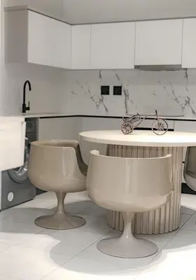 a kitchen with two chairs and a table in it at THE BLYDE CRYSTAL LAGOON F&S LUxurious Apartment 3bed in Pretoria