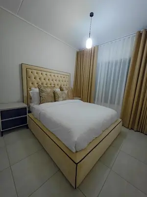 a bedroom with a large bed in a room at THE BLYDE CRYSTAL LAGOON F&S LUxurious Apartment 3bed in Pretoria