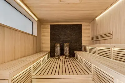 an empty sauna with two people in it at The Diplomat in Midrand
