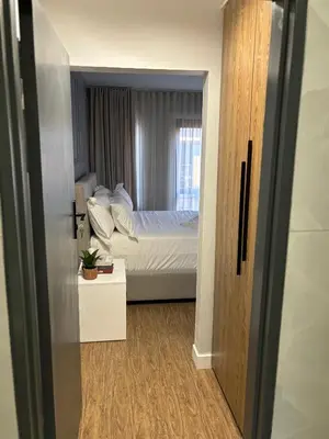 a bedroom with a bed and a window at 191 Protea Estate in Midrand