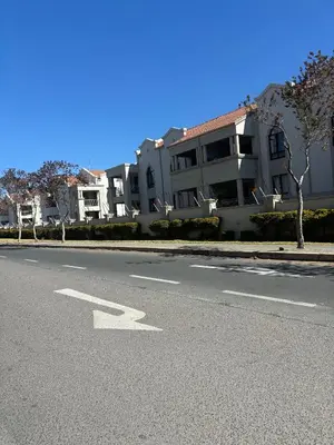an empty street with an arrow on the road at 191 Protea Estate in Midrand