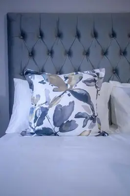 a pillow sitting on top of a bed at Midrand Cozy in Midrand
