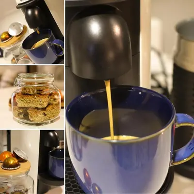 a coffee maker is making coffee in a cup at IBella's at The Urban in Pretoria
