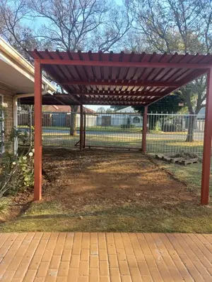 a wooden pergola sitting on top of a yard at House at Bethesda in Springs