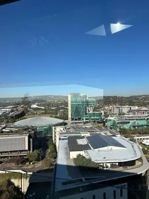 an overhead view of a city with a building at Trilogy Cozy Studio in Pretoria