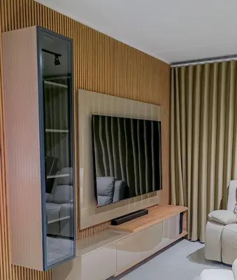 a living room with a television in a wall at The Blyde 3bed Beach Facing F&S Luxurious 2 in Pretoria