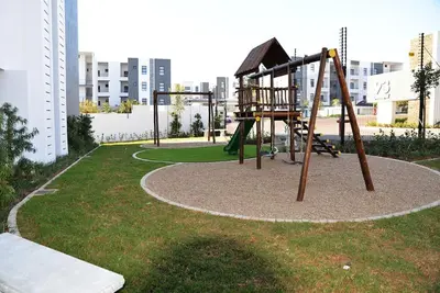 a playground in a park in a city at Eirini Elegant Hades Apartment in Midrand