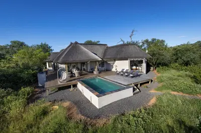 an aerial view of a house with a swimming pool at Villa Blaaskans in Hoedspruit