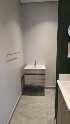 a bathroom with a sink and a counter at GrootBoom Guest Rooms in Pretoria