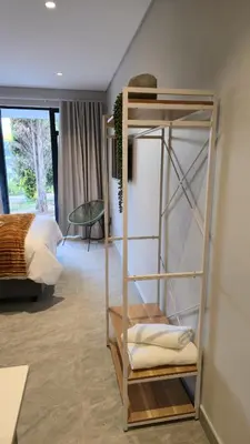 a room with two bunk beds and a bed at Grootboom Guest Rooms in Pretoria