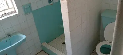 a bathroom with a toilet and a sink at Villa paradiso 1 in Centurion