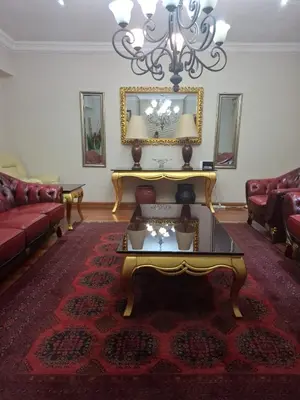 a living room with a couch and a table at Aaybee for Four in Midrand