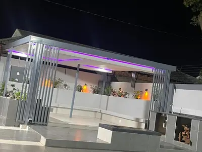a building with purple lights on it at night at Lupulo luxury boutique in Thohoyandou