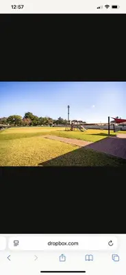 a screenshot of a picture of a park with a picnic table at Comfort Zone in Benoni