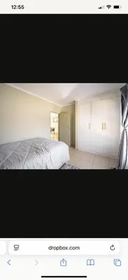 two pictures of a bedroom with a bed and a door at Comfort Zone in Benoni