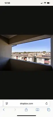 a view of a window with buildings in the background at Comfort Zone in Benoni