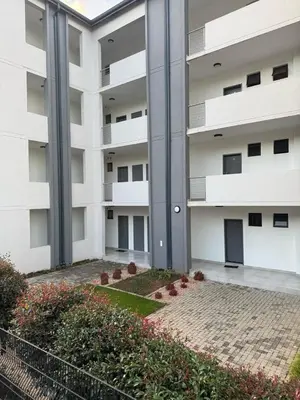 an external view of an apartment building at 1 bedroom cozy flat in Midrand