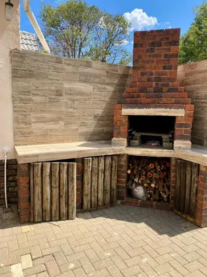 a brick pizza oven with a brick at Cosy Room steps from the lake- short term stay in Benoni