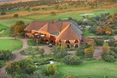 an overhead view of a large house with a large roof at 210 Zebula, 5-bedroom villa in Warmbaths