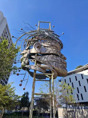 a large sculpture of aopus in a city at Emerald Studio Menlyn Maine in Pretoria