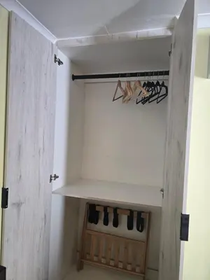 a room with a closet with shoes in it at Private Garden Studio near Menlyn in Pretoria