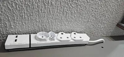 a white controller sitting on top of a table at Boabab at Greenway Woods in White River