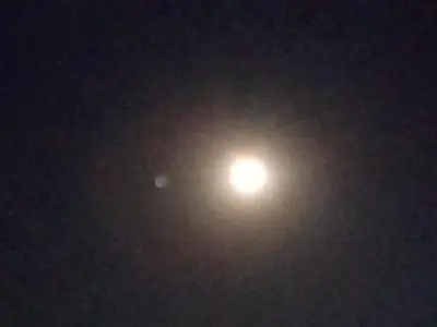 a bright light in the sky at night at I&S apartments & rentals in Burgersfort