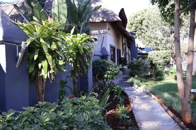 a garden path in front of a house at Golden Casa in Mokopane