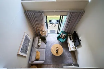 an overhead view of a living room with a couch and a table at Luxurious Loft in Pretoria