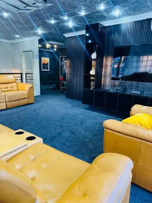a room with two couches and a couch at Sejpro Living at 1 Motse Street in Polokwane