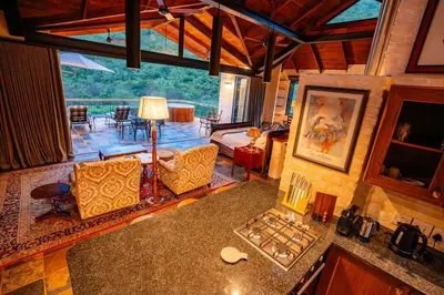 an overhead view of a living room with a table at Private luxurious suite on Heysbrook Estate halfway to Kruger National Park in Waterval-Onder