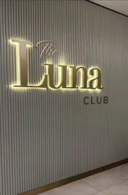 a sign on the side of a building at Luxury Penthouse Apartment Waterfall Midrand in Midrand