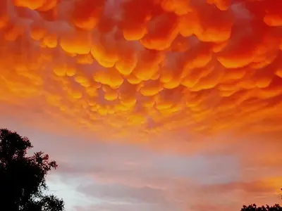an image of a cloudy sky at sunset at The Villa Luxe Hartbeespoort Golf and Wildlife Estate in Hartbeespoort
