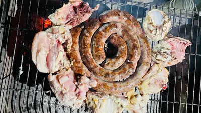 a bunch of food sitting on a grill at De whytehouse Mogalatsane in Marble Hall