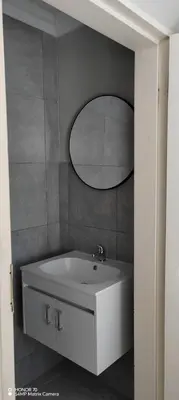 a bathroom with a white sink and a mirror at Casa LaMich Garden Venue and Spa in Midrand