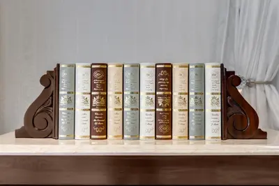 a row of books sitting on a shelf at Concordia Boutique Venue in Midrand