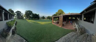 an overhead view of a building with a grass yard at Wagenbietjieshoek Wilgekraal Farmhouse in Lydenburg