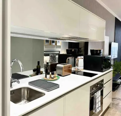 a kitchen with a sink and a counter top at Explore Ellipse - Emerald Studio in Midrand