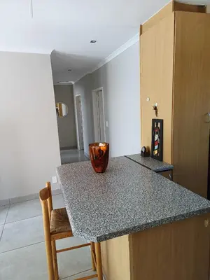 a kitchen with a counter with a bowl on top of it at Centurion villa in Centurion