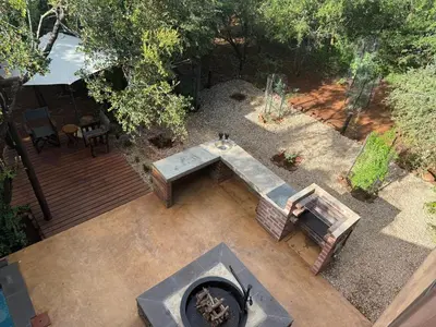 an overhead view of a backyard with a fire pit at Sunset Bush Retreat & Safari's in Marloth Park