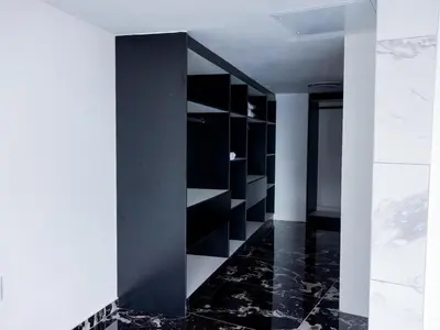 a room with a black and white wall at Pent Lucius - 3 bedroom Penthouse in Pretoria